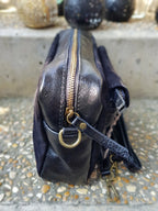     Profil du sac en cuir irisé