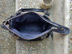     Intérieur du sac Aurora avec poche zippée