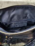     Compartiment principal du sac Aurora en cuir irisé