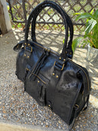     Poche extérieure zippée du sac Aurora en cuir mat